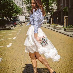 White skirt with book bag