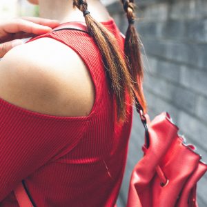 red blouse and red backpack